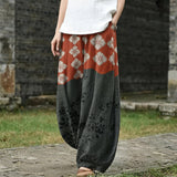Florenz – Weite Hose mit orangefarbenem Blumenmuster