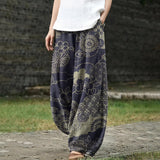 Lucienne – Weite marineblaue Hose mit Chrysanthemenmuster