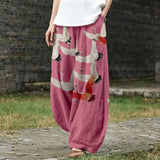 Noémie – Weite rosa Hose mit Kranichmuster