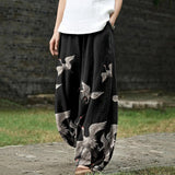 Françoise – Schwarze weite Hose mit Kranichmuster