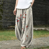 Denise – Beiger weit geschnittener Hosen mit roten Blattmotiven