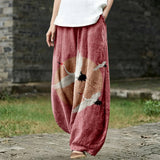 Jacqueline – Weite Hose mit rosa Vogelmotiv