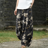 Ghislaine – Schwarze weite Hose mit Vogelmotiv